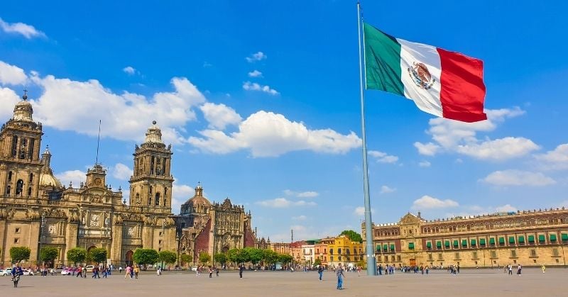 Mexican flag flying over the Zócalo in Mexico City